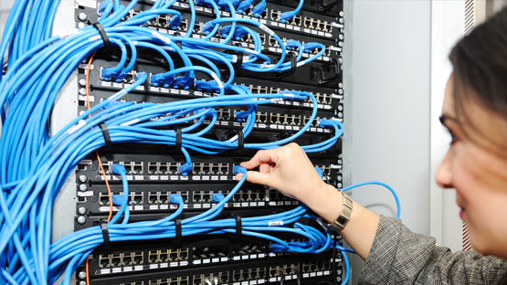 Network administrator configuring switches