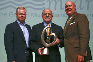 Miami Dade College President Dr. Eduardo J. Padrón (center) recently received the Henry M. Flagler Award, named after Miami’s founding father, for the Greater Miami Chamber of Commerce, for his vision and leadership in higher education. Here, he is joined by Chamber President Barry Johnson (left) and new Chamber Chairman Carlos Fernández-Guzmán, an MDC alumnus.