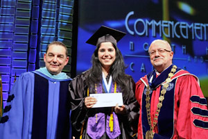 Dr. Jose A. Vicente, Anahi Cortada, Jack Kent Cooke scholarship winnerand Dr. Eduardo J. Padron. 