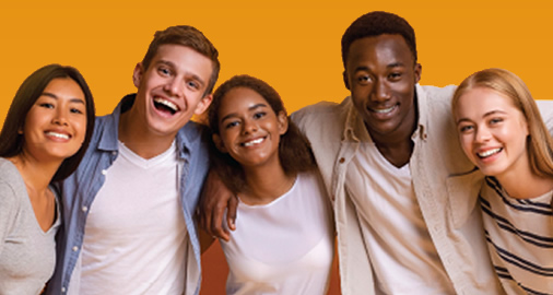 Image of five students smiling together