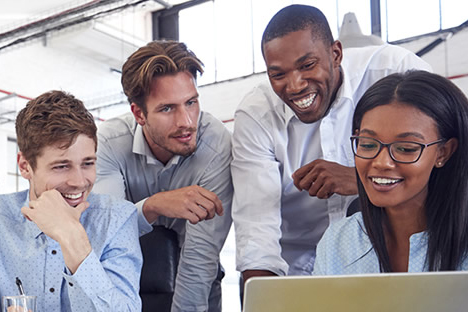 Young adults looking at the screen