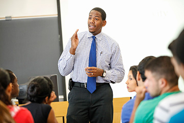 Professor in a classroom with students