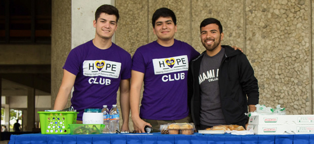 Three students from the HOPE club