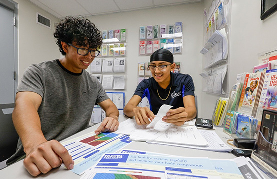 Pathways to success - members having consultations about results