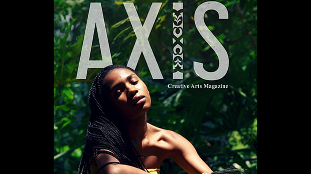 Cover of AXIS Magazine showing a young woman posing outside in a yellow dress