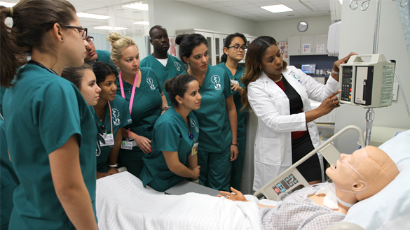 Instructor and Students in patient simulator lab