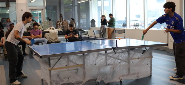 Students playing ping pong at Padron Campus