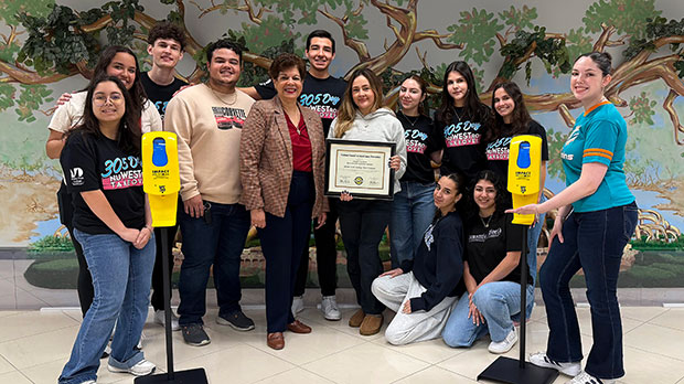 a group of students awarded the Platinum Level Skin Smart Campus Award